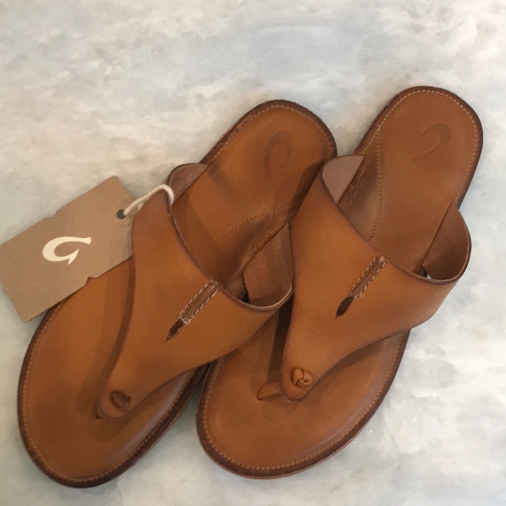 Olukai mustard colored, womens size 8 sandal. Never worn, with tags and box.